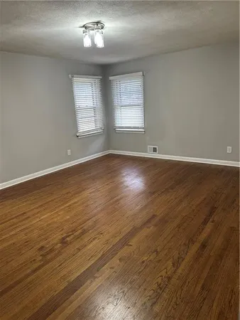 a bathroom with a toilet a sink and bathtub