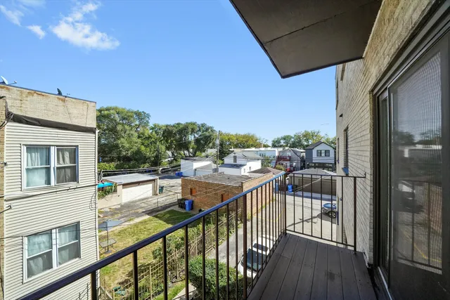 a view of a balcony with city view