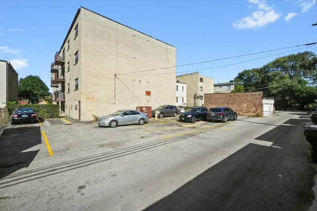 a view of a street with cars