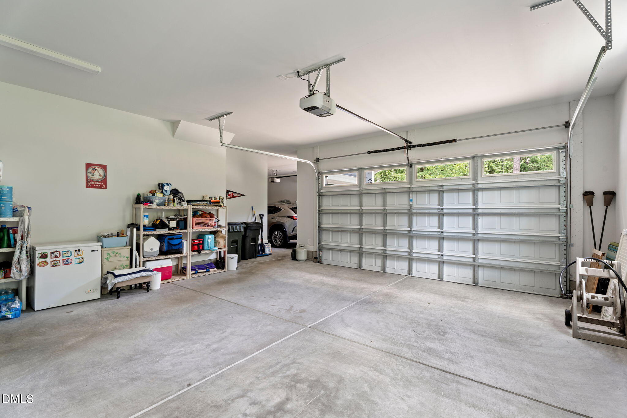 223 Colonial Ridge Drive Pittsboro, NC 27312 - Photo 32 of 47 a view of a garage with storage