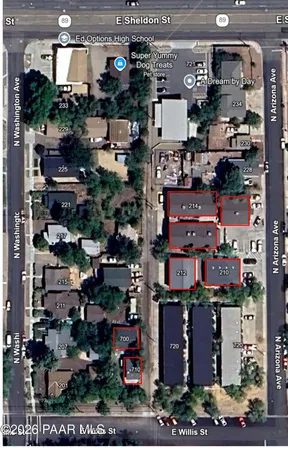 a view of a car park in front of house