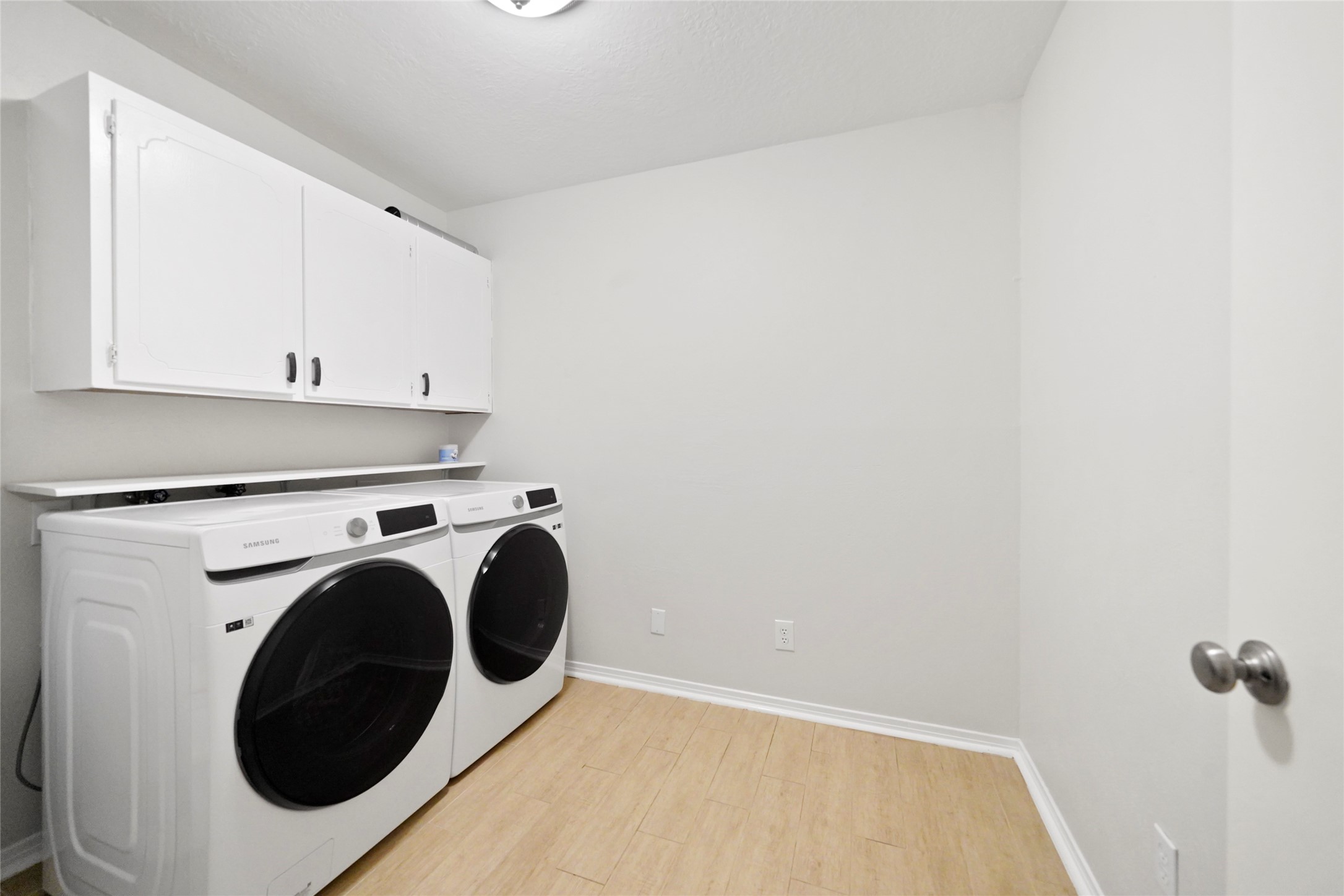 14443 Lyric Road Conroe, TX 77302 - Photo 36 of 49 Laundry room, washer and dryer included in the sale