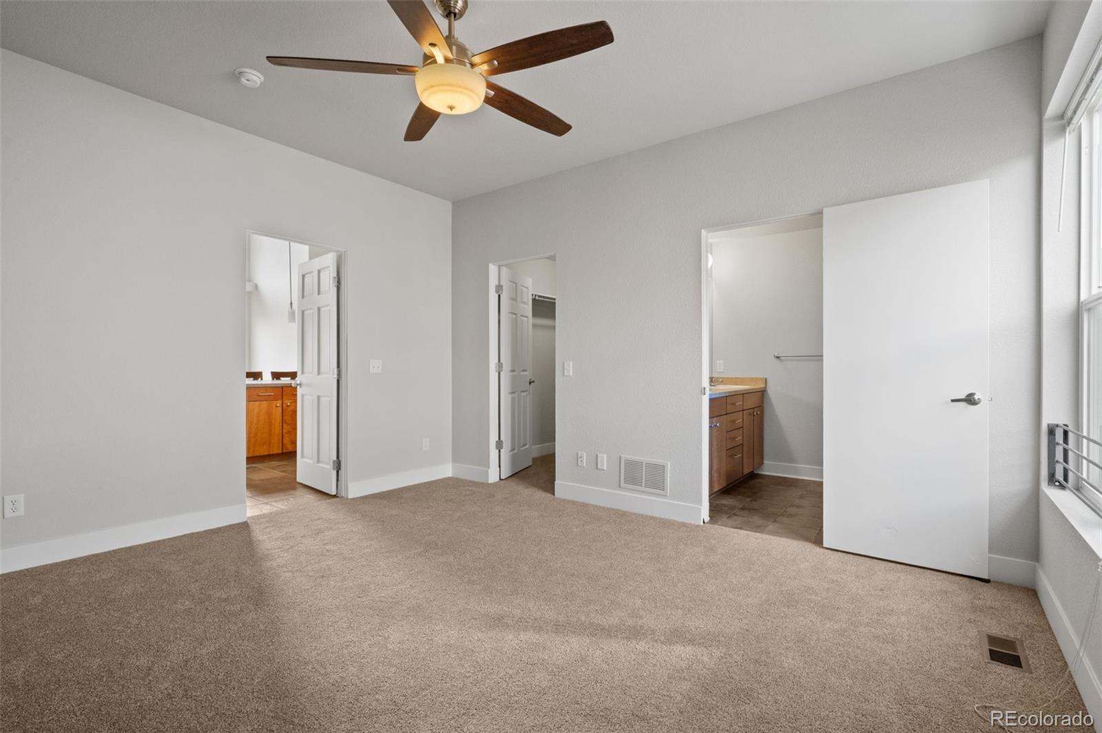 2360 South Wheeling Circle Aurora, CO 80014 - Photo 21 of 31 a view of empty room with ceiling fan