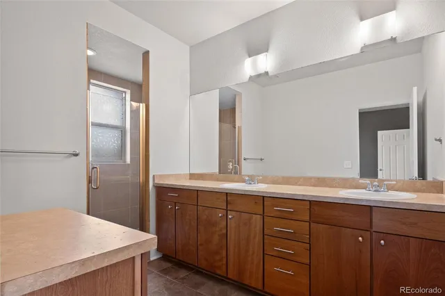 a bathroom with a toilet a sink and bathtub