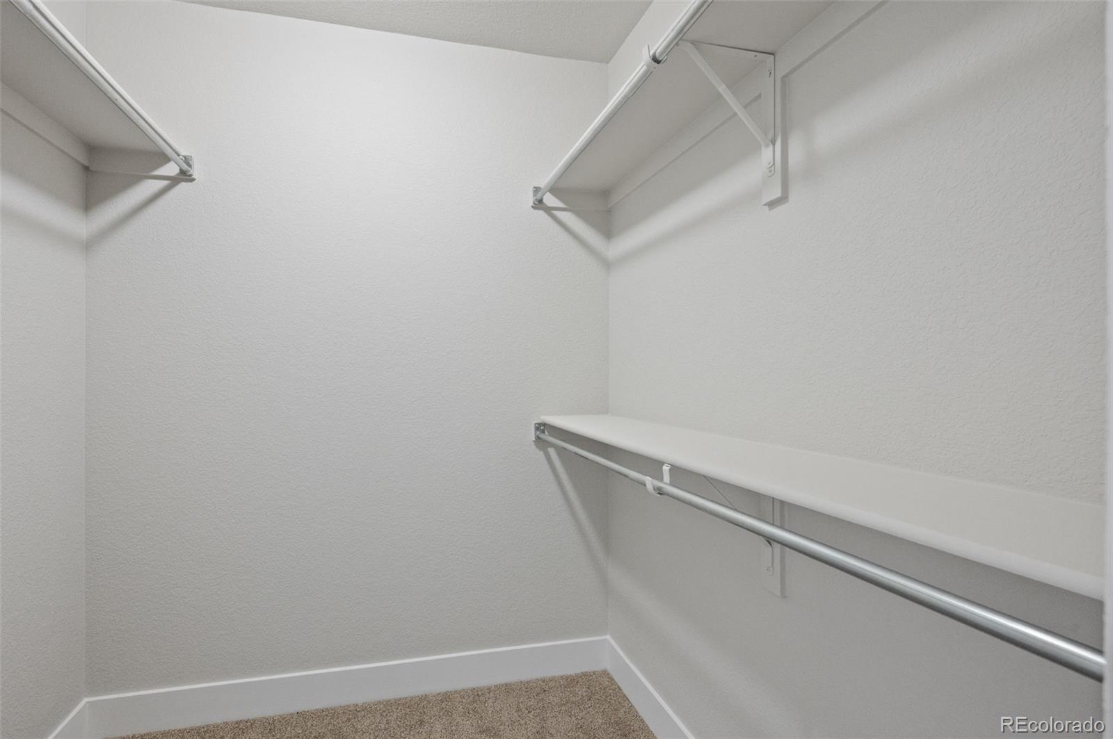 2360 South Wheeling Circle Aurora, CO 80014 - Photo 25 of 31 a view of small space with racks on the wall