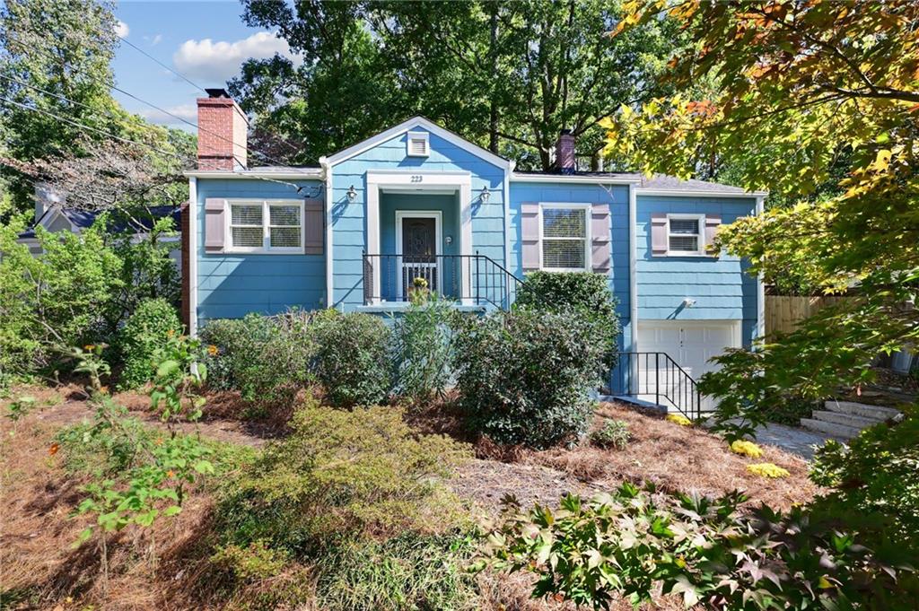 223 Kathryn Avenue Decatur, GA 30030 - Photo 1 of 1 a front view of a house with a yard and trees