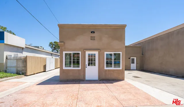 a front view of a house with yard
