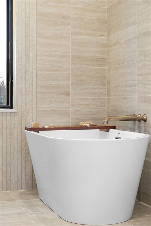 27 2nd Street Natick, MA 01760 - Photo 24 of 39 a view of a bathtub in a bathroom