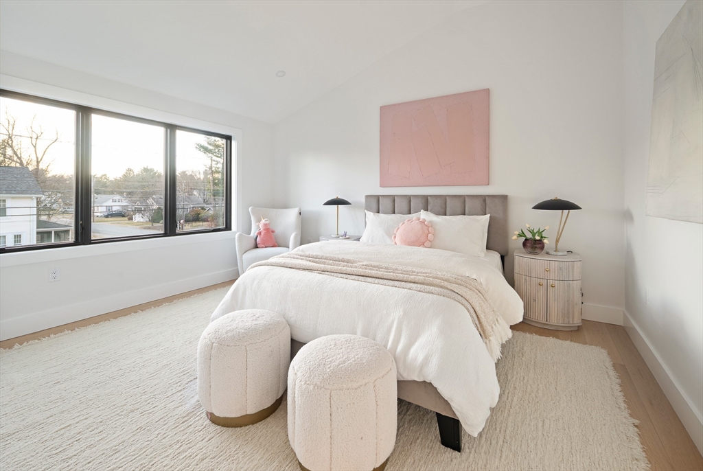 27 2nd Street Natick, MA 01760 - Photo 25 of 39 a bed room with a bed and a large window