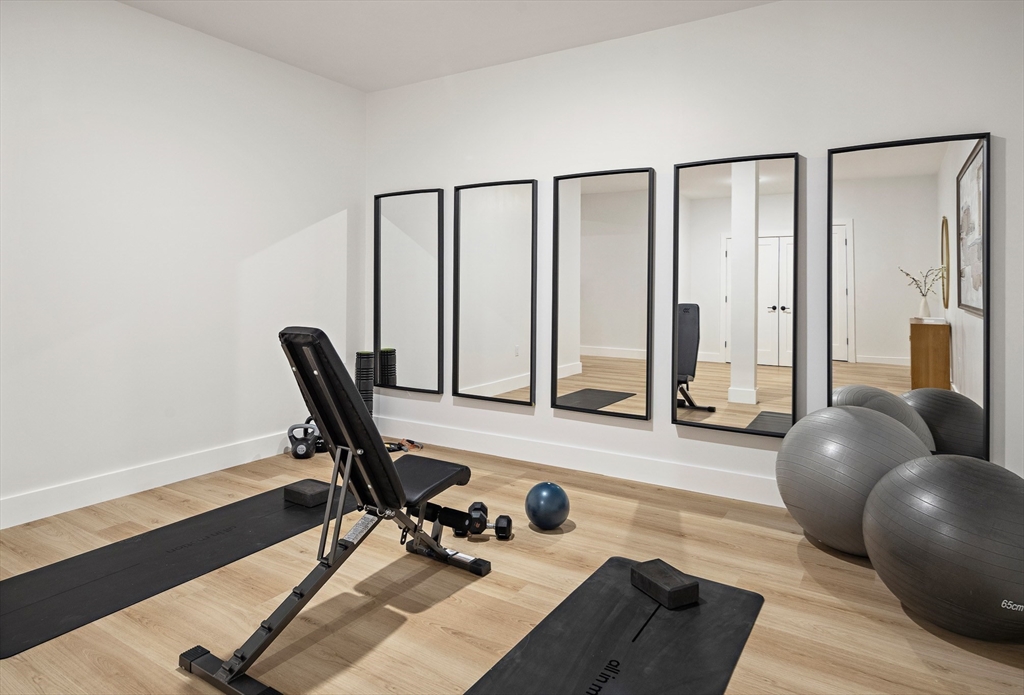 27 2nd Street Natick, MA 01760 - Photo 33 of 39 a view of a workspace with furniture and a window