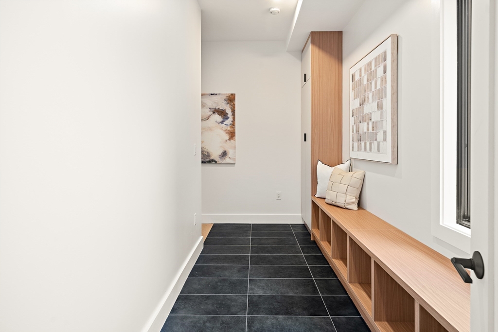 27 2nd Street Natick, MA 01760 - Photo 35 of 39 a view of a hallway with windows