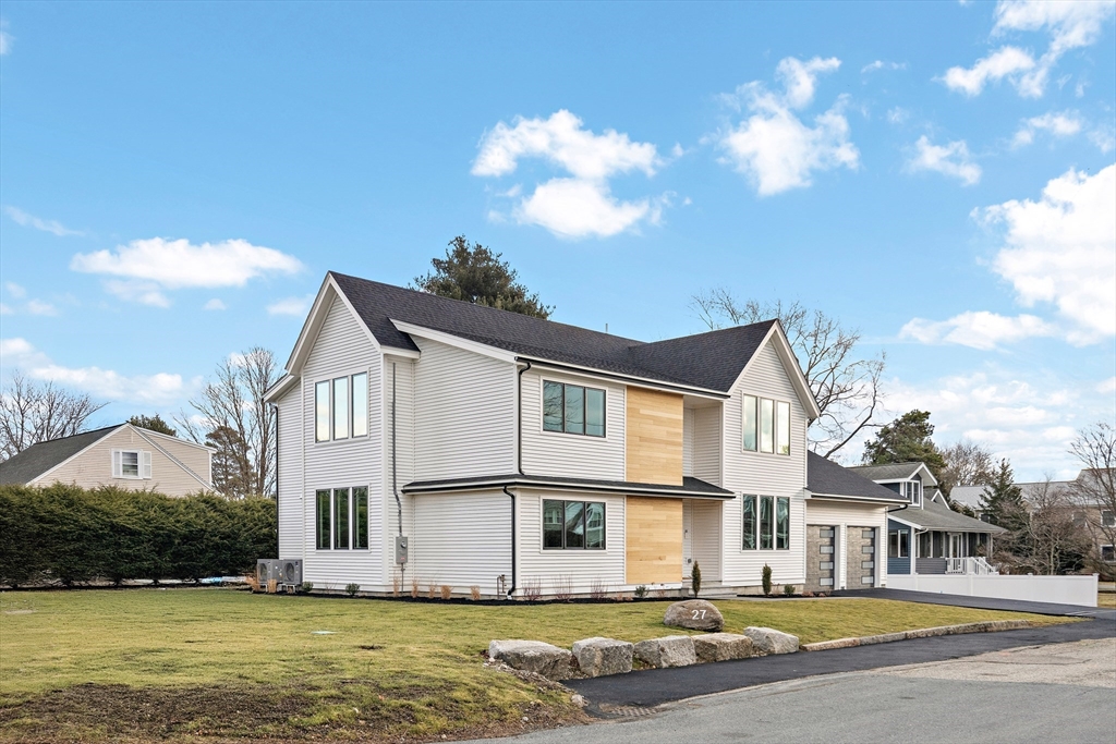 27 2nd Street Natick, MA 01760 - Photo 38 of 39 a front view of a house with a ocean view