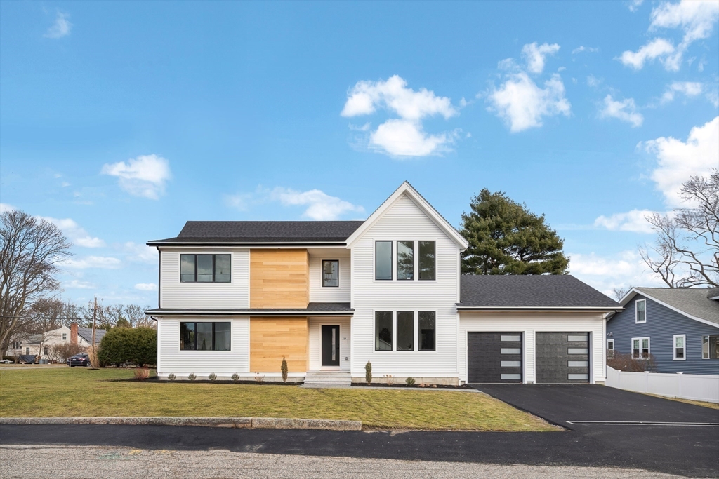 27 2nd Street Natick, MA 01760 - Photo 39 of 39 front view of a house with a street