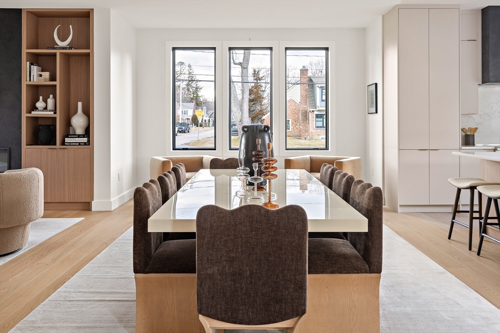 27 2nd Street Natick, MA 01760 - Photo 10 of 39 a view of a dining room with furniture window and wooden floor
