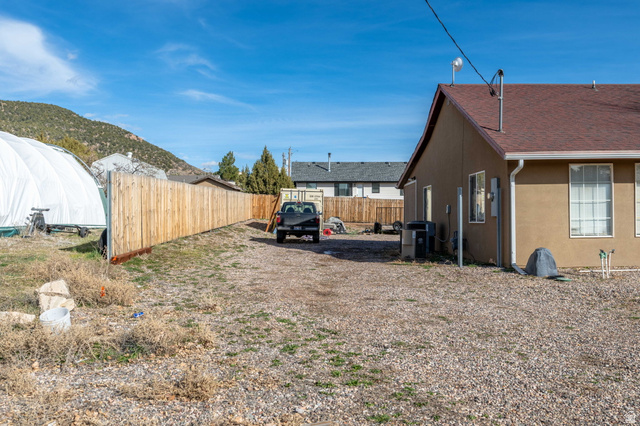 348 North Lodge Road Central, UT 84722 - Photo 17 of 25 Fenced yard featuring a mountain view