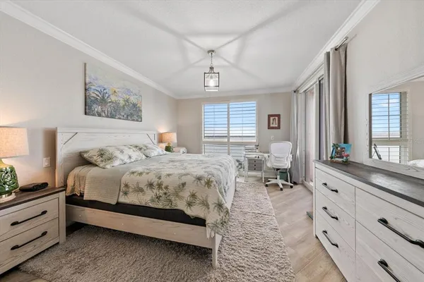 a bathroom with a granite countertop sink mirror and bathtub