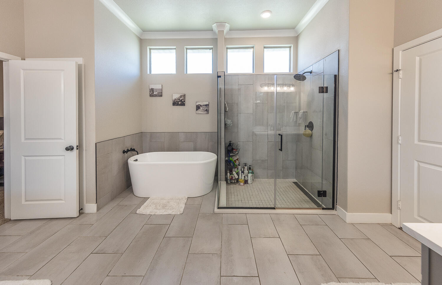 7334 29th Street Lubbock, TX 79407 - Photo 14 of 31 a bathroom with a sink and shower