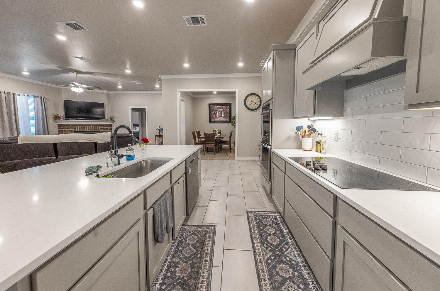 7334 29th Street Lubbock, TX 79407 - Photo 27 of 31 a large white kitchen with a large counter top furniture and kitchen view