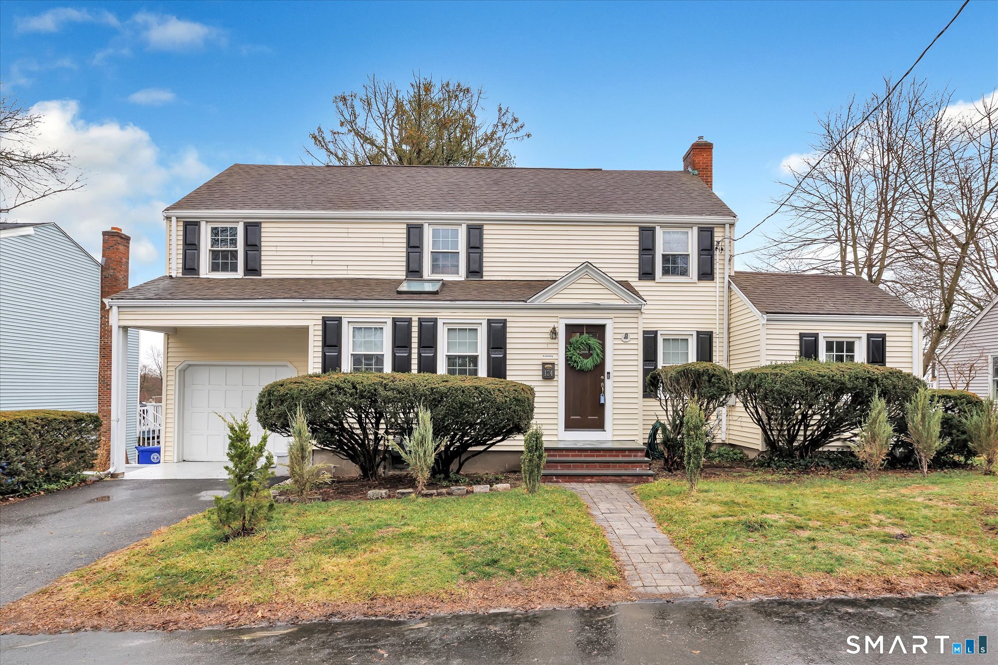 124 Stiles Street Stratford, CT 06614 - Photo 1 of 1 a front view of a house with a yard