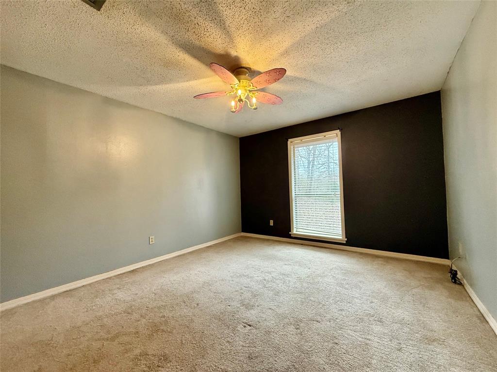 2104 Greenbriar Drive Ruston, LA 71270 - Photo 23 of 35 a view of an empty room with a window
