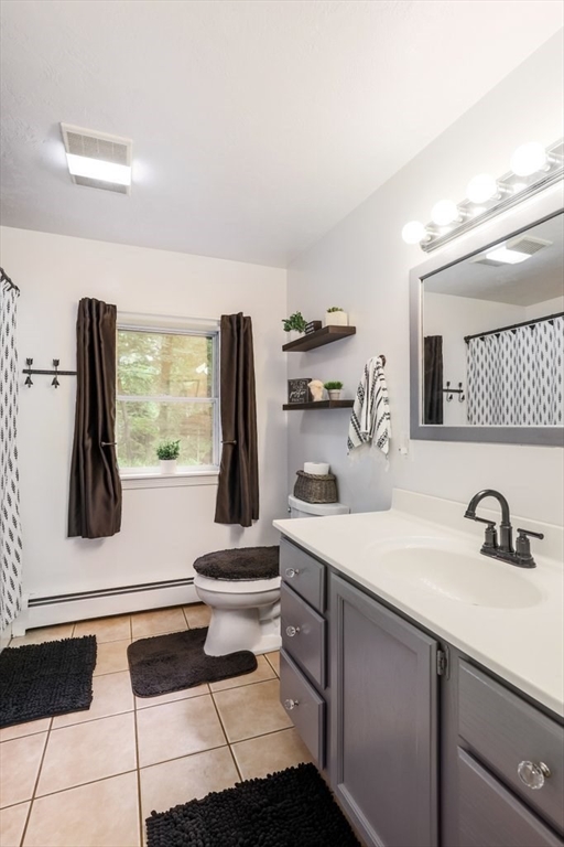 10 Bernie Road Holland, MA 01521 - Photo 14 of 29 a bathroom with a sink and a mirror