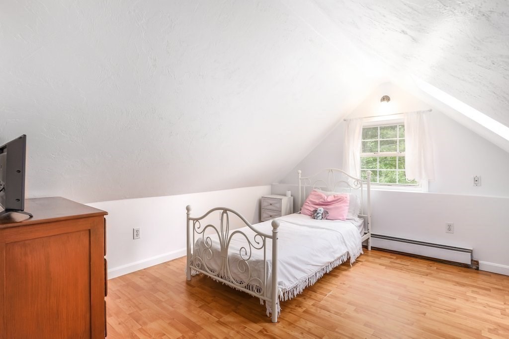10 Bernie Road Holland, MA 01521 - Photo 19 of 29 a bedroom with a bed and a window