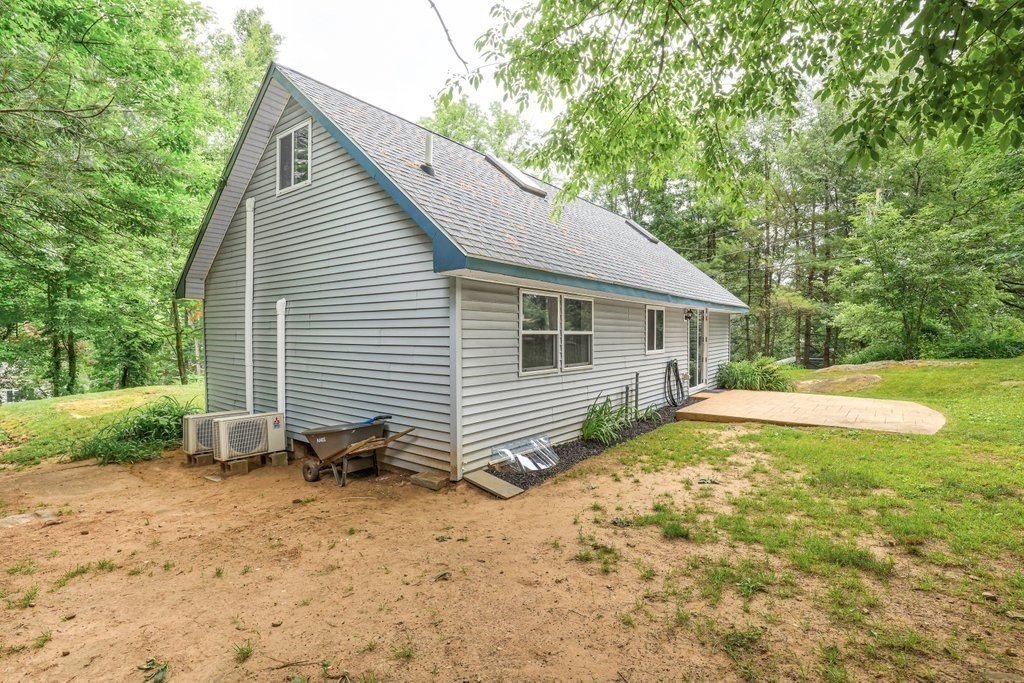 10 Bernie Road Holland, MA 01521 - Photo 26 of 29 a view of a house with a yard