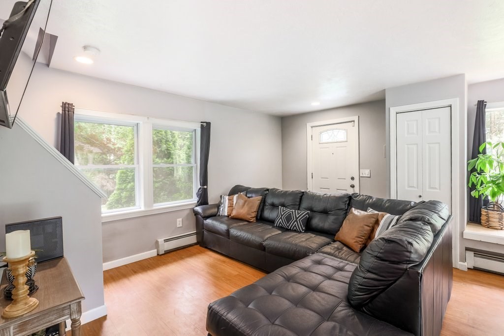 10 Bernie Road Holland, MA 01521 - Photo 8 of 29 a living room with furniture and a large window