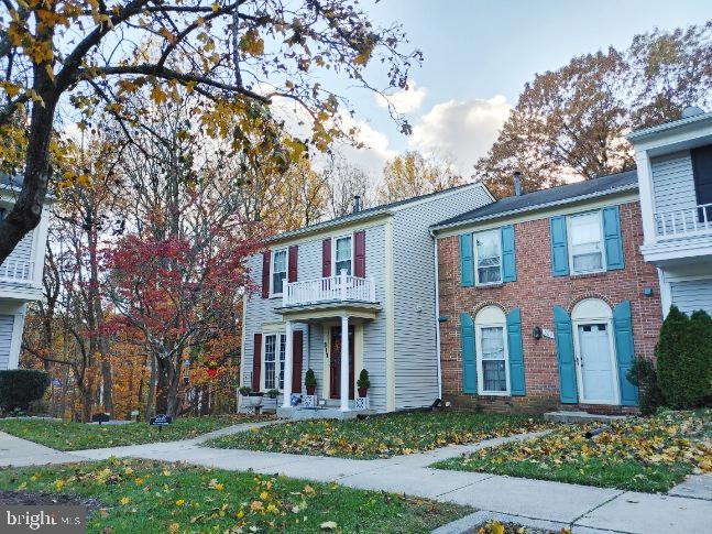 309 Crescendo Way Silver Spring, MD 20901 - Photo 3 of 4 front view of house with a yard