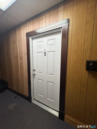 a view of a hallway with closet