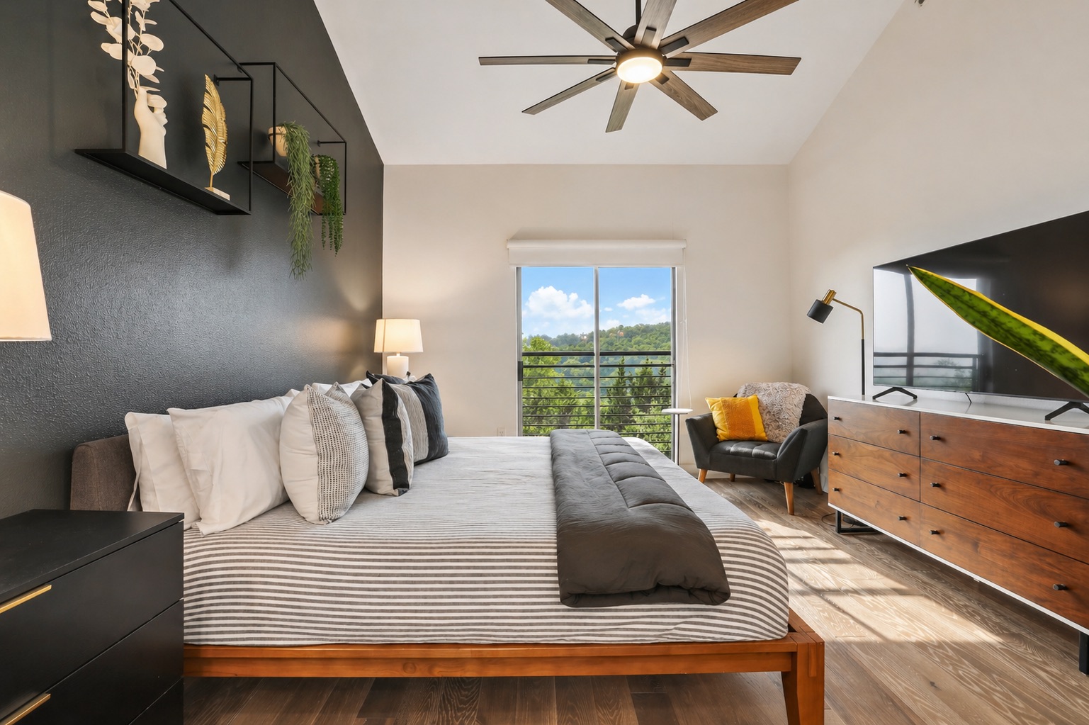8110 Ranch Road 2222, Unit 10 Austin, TX 78730 - Photo 10 of 23 a bedroom with a bed and window
