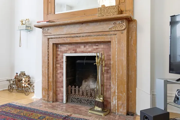 a view of living room with a fireplace