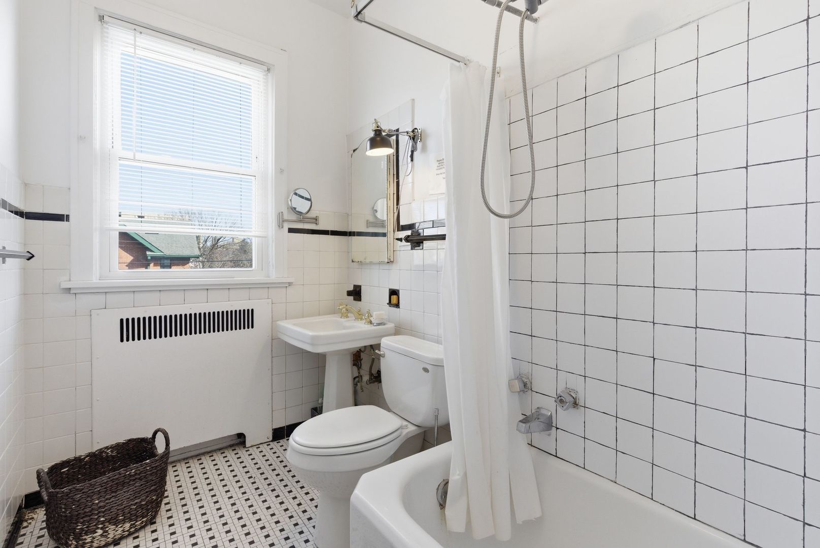 2001 Orrington Avenue, Unit 2001 Evanston, IL 60201 - Photo 28 of 50 a bathroom with a sink toilet and shower