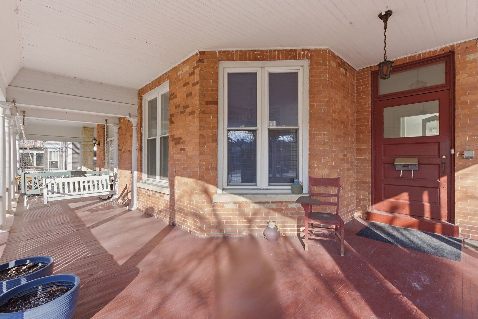 2001 Orrington Avenue, Unit 2001 Evanston, IL 60201 - Photo 3 of 50 a view of a balcony with a floor to ceiling window and wooden floor