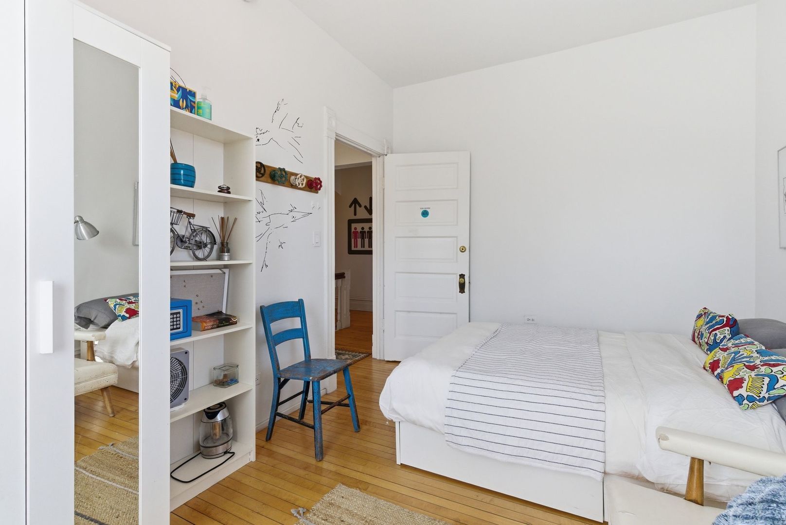 2001 Orrington Avenue, Unit 2001 Evanston, IL 60201 - Photo 31 of 50 a bedroom with a bed and a refrigerator