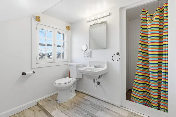 a bathroom with a sink and a toilet