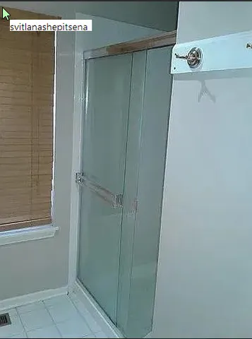 a kitchen with kitchen island granite countertop a sink a stove and a refrigerator