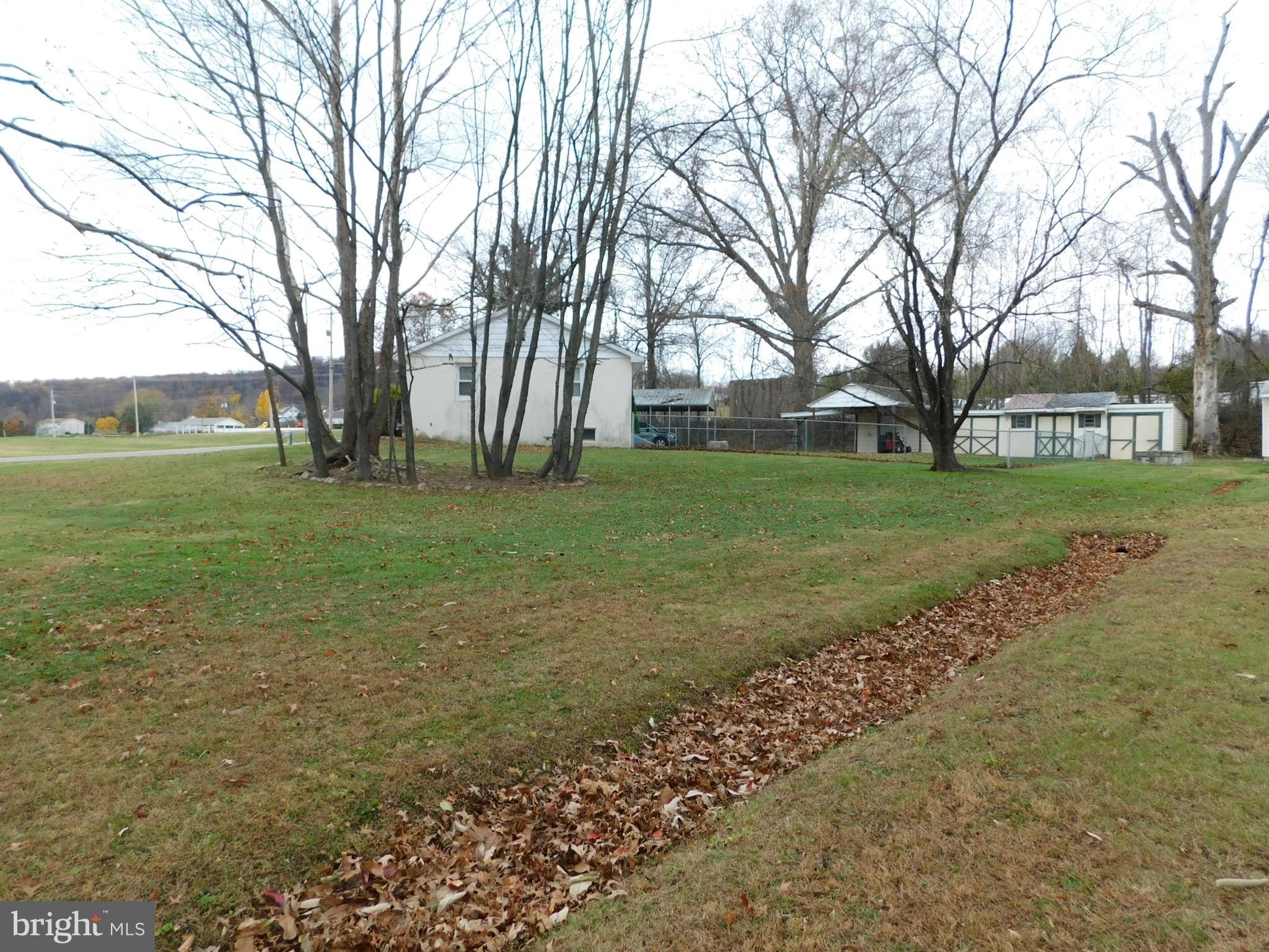 115 Limekiln Road Bechtelsville, PA 19505 - Photo 15 of 17 a view of a park with large trees
