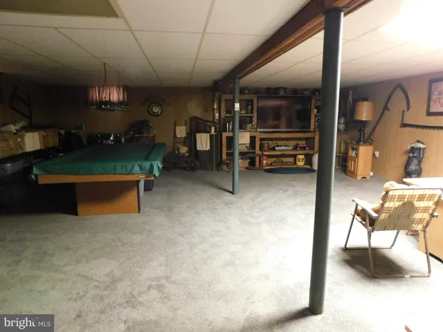 a view of a room with furniture