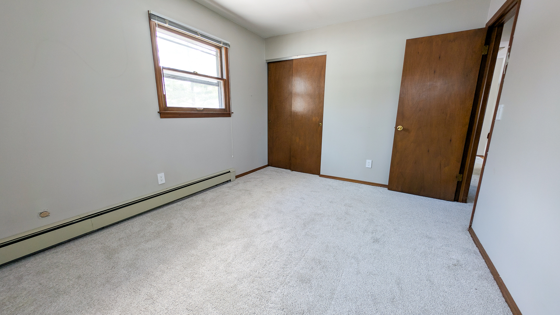 502 South Main Street St. Joseph, IL 61873 - Photo 16 of 25 an empty room with windows and closet