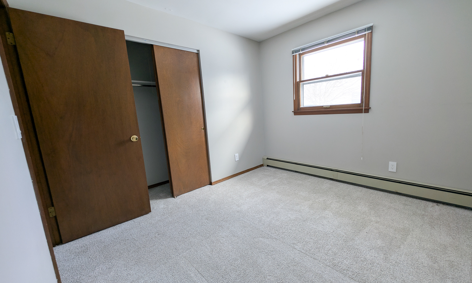 502 South Main Street St. Joseph, IL 61873 - Photo 21 of 25 an empty room with windows and closet