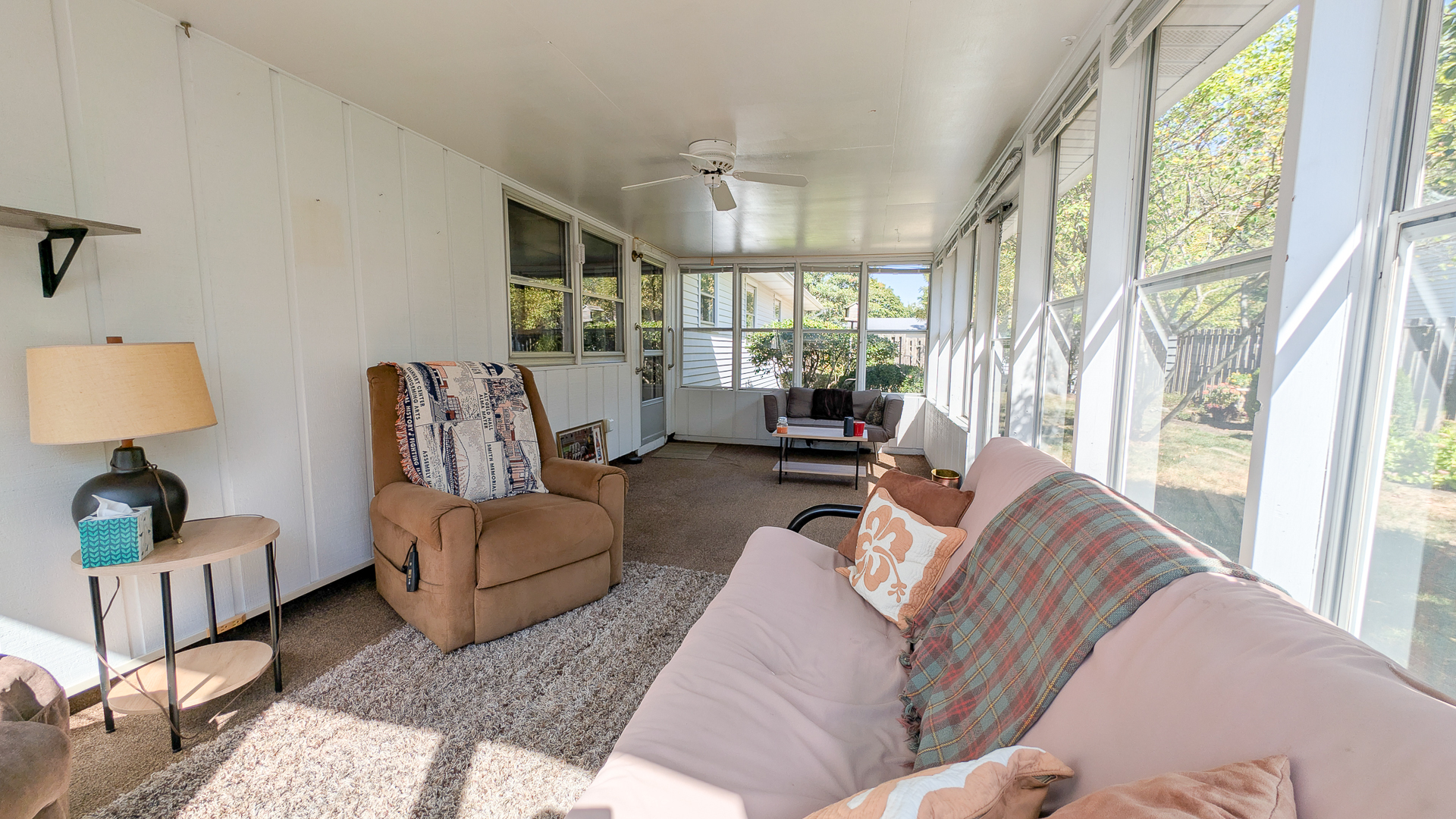 502 South Main Street St. Joseph, IL 61873 - Photo 23 of 25 a living room with furniture and a large window