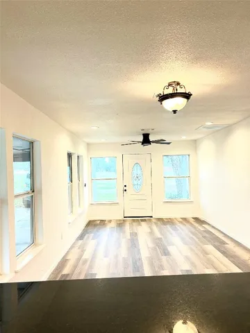 a view of empty room with a window