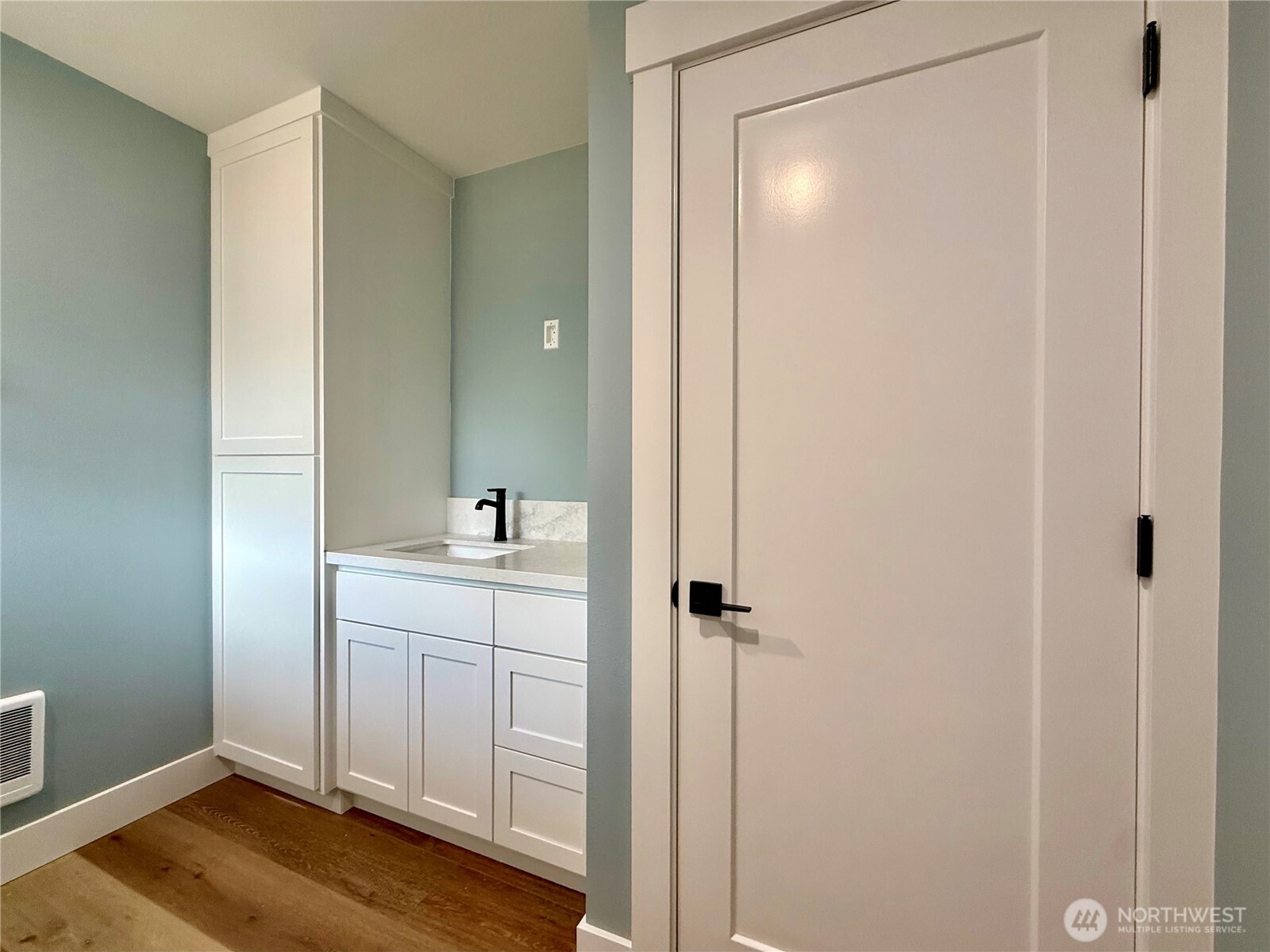 716 Reporter Court Southwest Ocean Shores, WA 98569 - Photo 29 of 36 a bathroom with a sink and a mirror