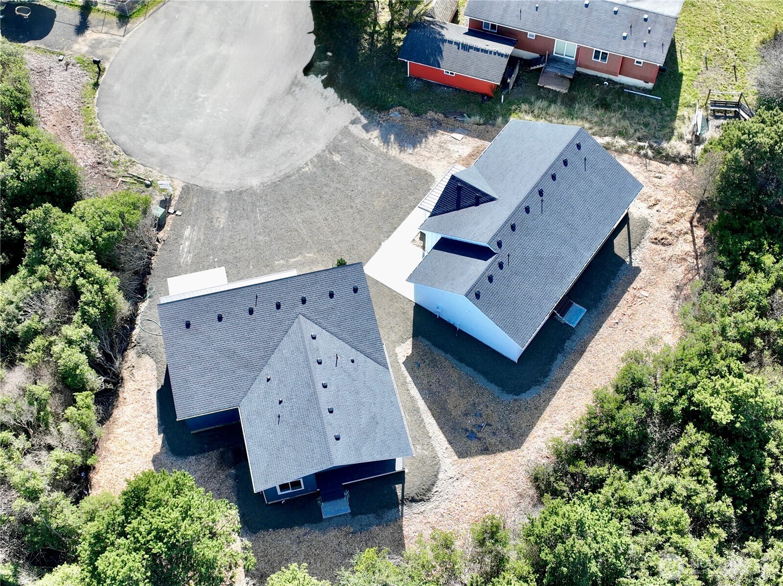 716 Reporter Court Southwest Ocean Shores, WA 98569 - Photo 3 of 36 an aerial view of a house with a yard