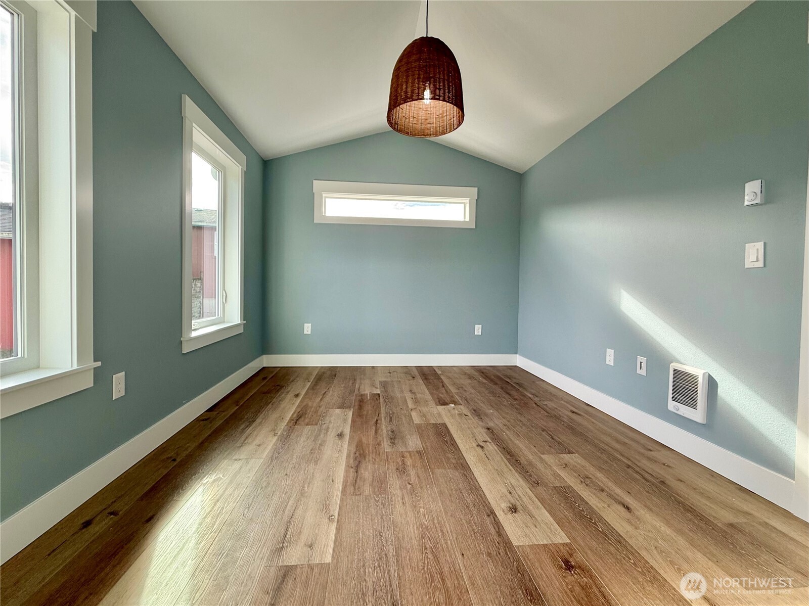 716 Reporter Court Southwest Ocean Shores, WA 98569 - Photo 33 of 36 a view of empty room with wooden floor
