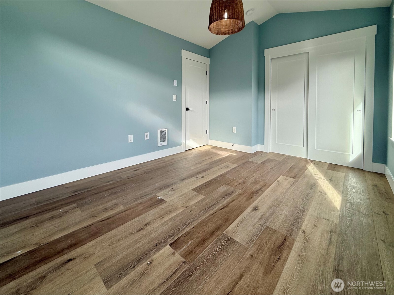 716 Reporter Court Southwest Ocean Shores, WA 98569 - Photo 34 of 36 en empty room with wooden floor