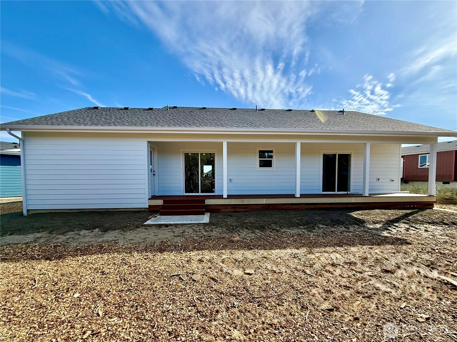 716 Reporter Court Southwest Ocean Shores, WA 98569 - Photo 5 of 36 a view of a house with a yard and potted plants