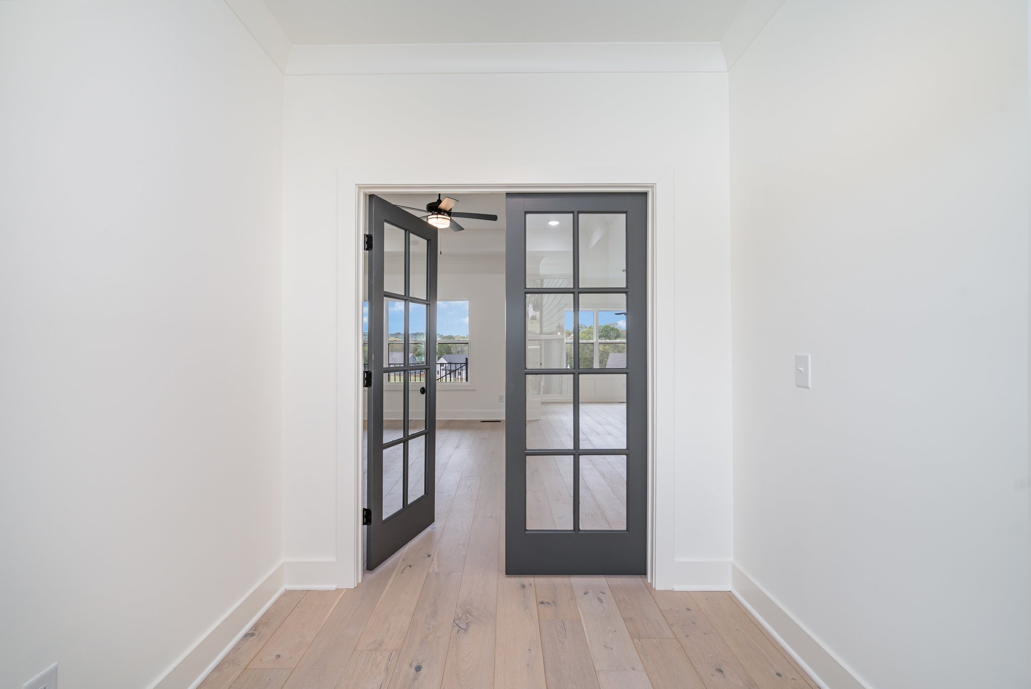 115 Crenshaw Road Hartsville, TN 37074 - Photo 12 of 40 a view of a hallway with wooden floor and entryway