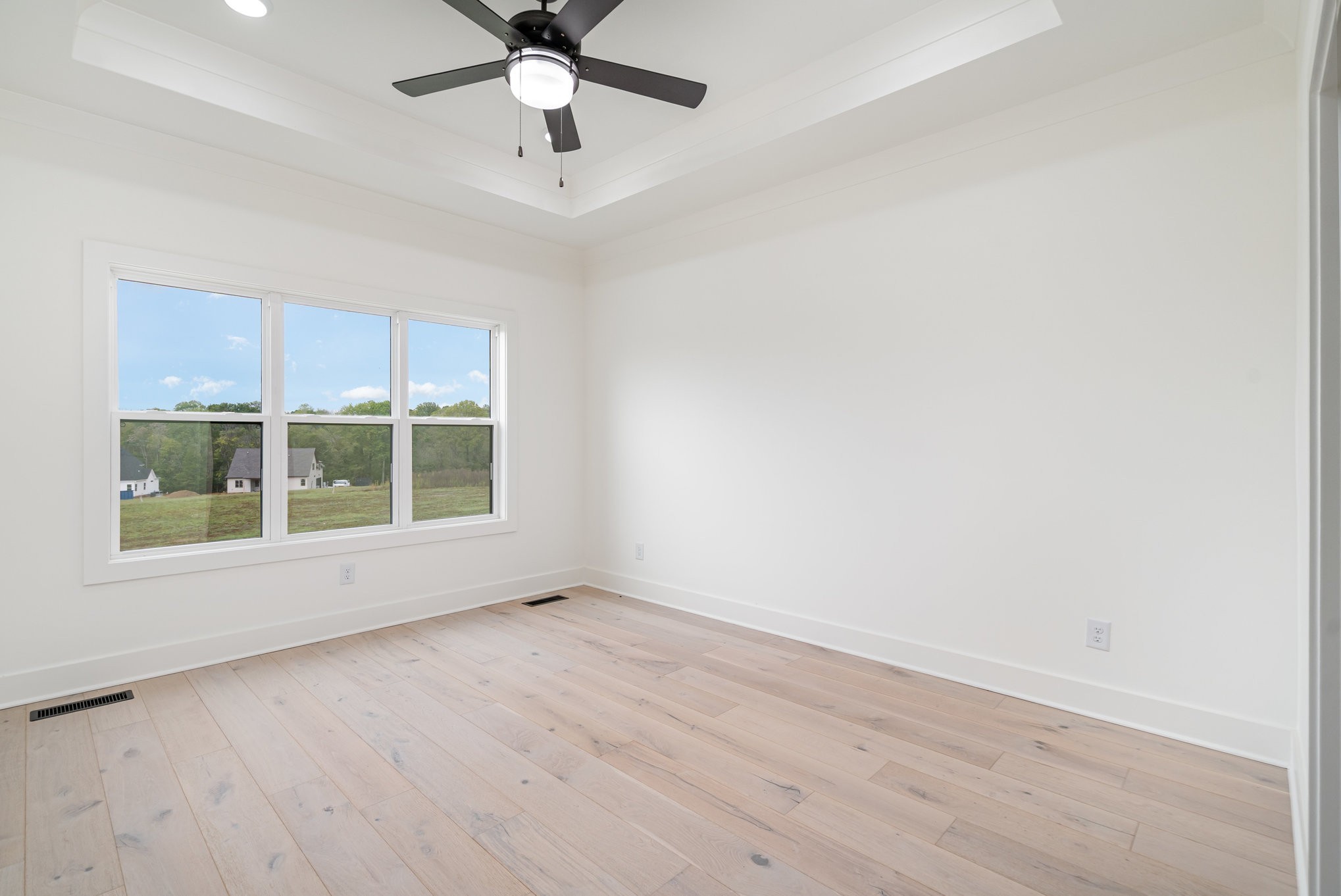 115 Crenshaw Road Hartsville, TN 37074 - Photo 15 of 40 wooden floor in an empty room with a window